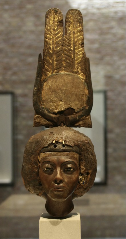 Wooden sculpted bust of Hatshepsut wearing a gilded double-plume crown